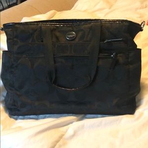Coach multipurpose diaper bag or tote bag.